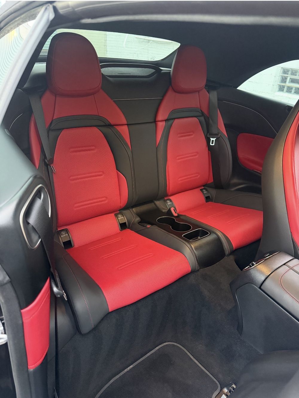 Mercedes-AMG red leather rear seats after detailing