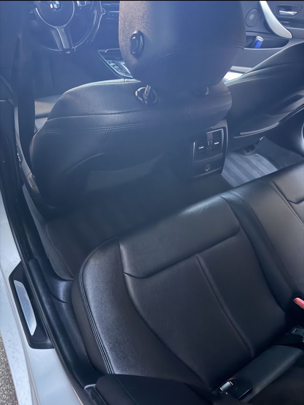Rear seat of the same BMW 4 Series after detailing