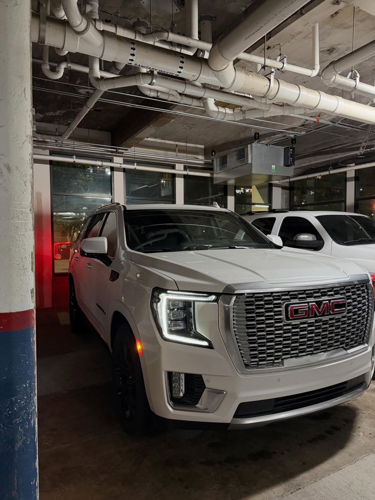 White GMC Yukon Denali after a detail