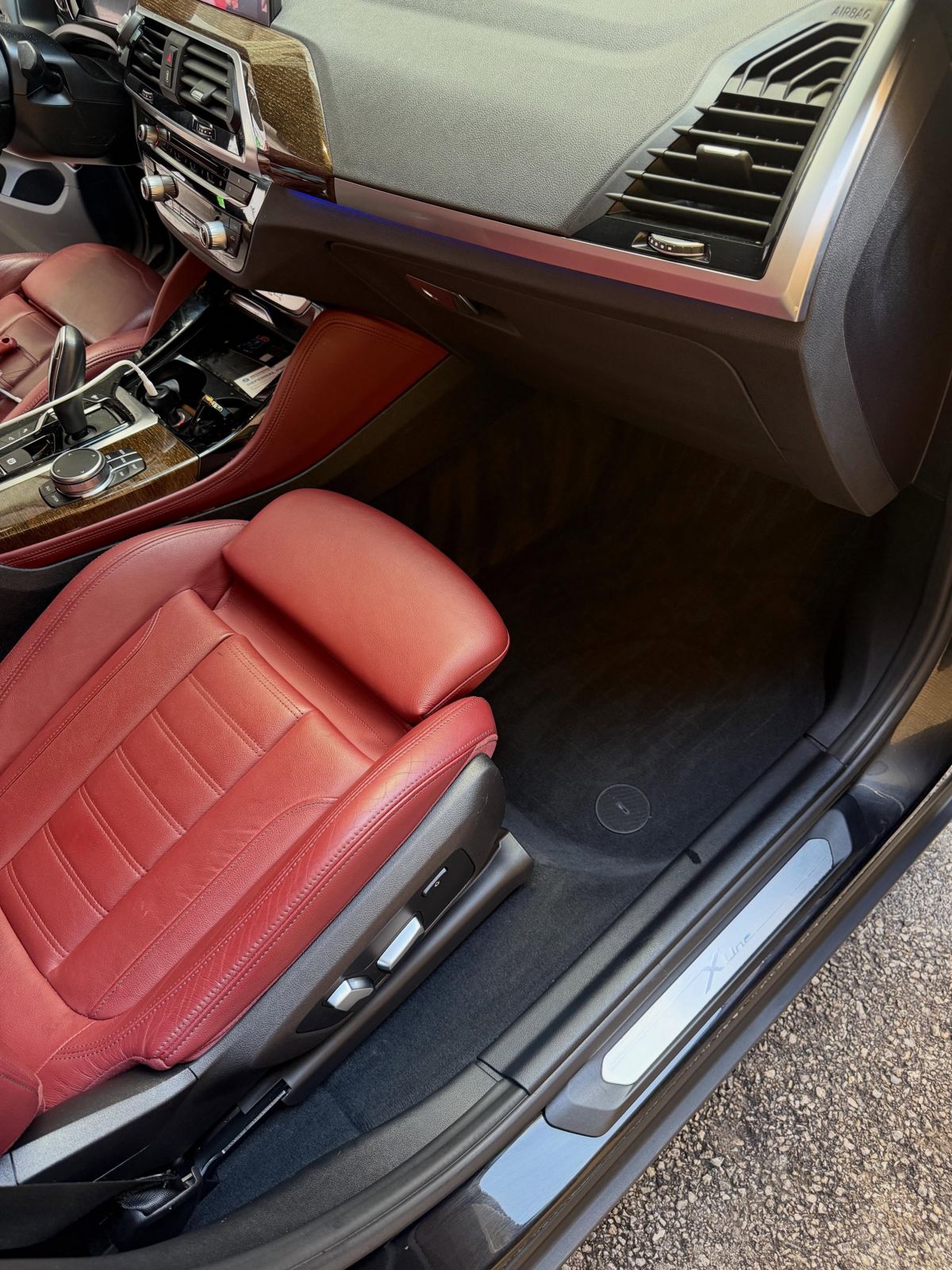 BMW red leather seat after cleaning and conditioning