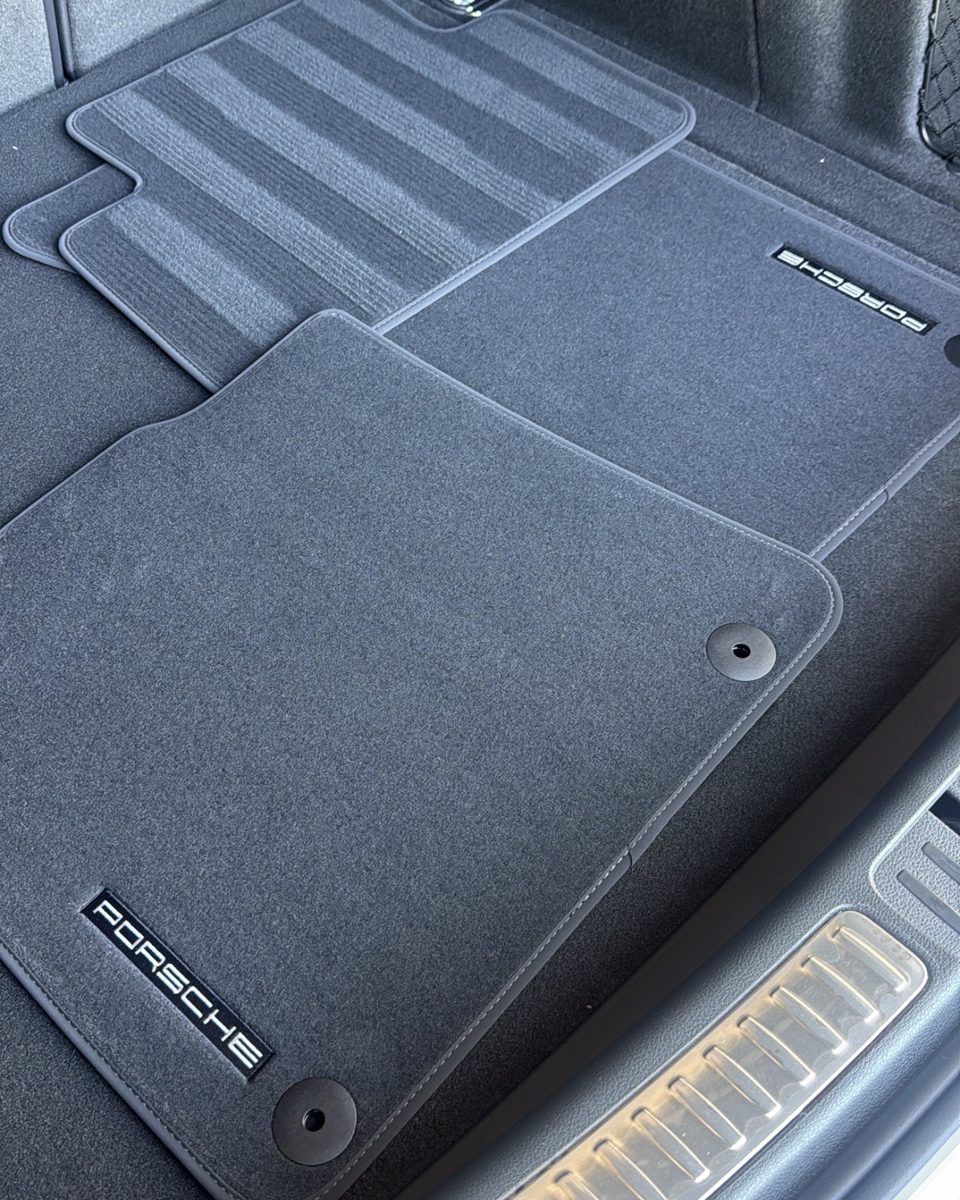 Porsche cargo area and floor mats after detailing
